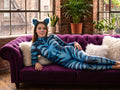 Women's striped cat catsuit, blue stripes with subtle muscle print, on a model