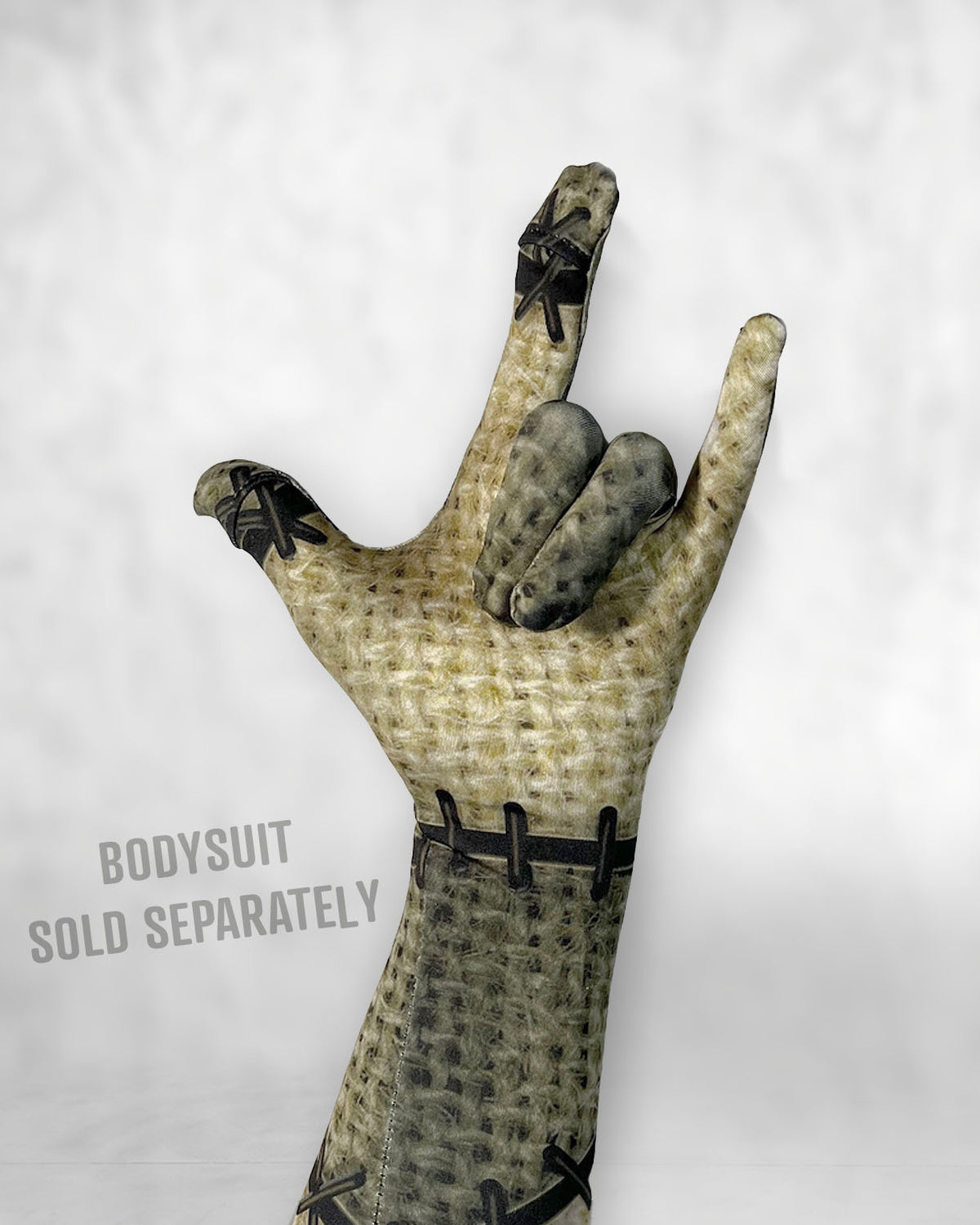 Burlap patchwork doll costume glove on a hand; bodysuit sold separately